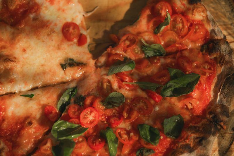 Classic Margherita mod pizza with fresh mozzarella and basil
