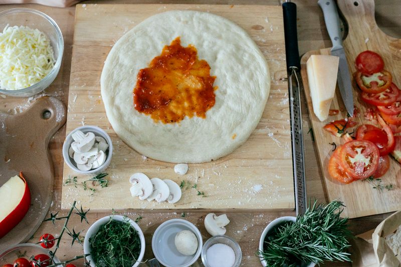Fresh pizza ingredients prepared at Mod Pizza