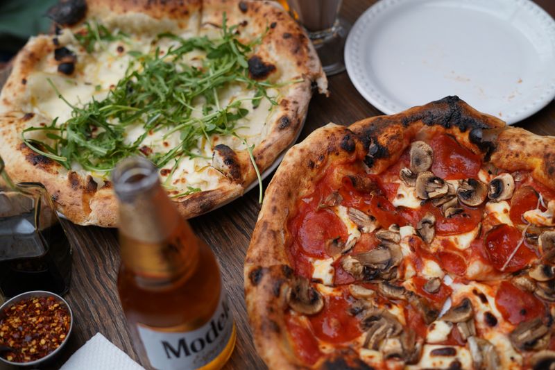 Meat Lovers mods pizza loaded with sausage and bacon